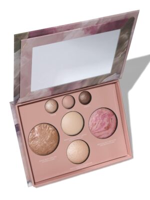 A palette of Laura Geller New York's best baked makeup products, showcasing a variety of shades and finishes, including eyeshadows, blushes, and highlighters."