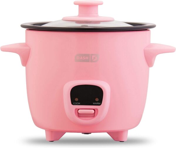 A colorful DASH Mini Rice Cooker Steamer sits on a kitchen countertop, surrounded by fresh ingredients and cooking utensils. The LED indicators and intuitive controls are visible, highlighting its user-friendly design. With its compact size and versatile functionality, this appliance promises convenient and efficient rice cooking, steaming, and meal preparation.