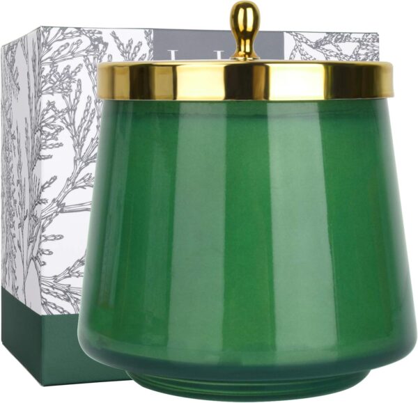A decorative green glass jar candle with a wooden lid, featuring a sleek and elegant design. This candle, created by LA JOLIE MUSE, is scented with a blend of fir and cedarwood, offering a fresh and earthy aroma reminiscent of evergreen forests. The glass jar has a shiny finish, and the wooden lid can be used as a coaster or to preserve the scent when the candle is not in use. The candle is made from natural soy wax, ensuring a clean burn with minimal soot, and uses a lead-free cotton wick for even burning. This design and fragrance make it ideal for use in various spaces, adding a festive and calming atmosphere to the home, especially during winter or holiday seasons. It also serves as a thoughtful gift, with eco-friendly features and a versatile scent profile that appeals to a wide range of tastes.