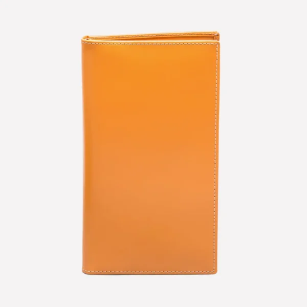 The image at the provided URL depicts the Bridle Hide Large Zip-Around Purse by Ettinger London. It is a stylish leather wallet with a zip-around closure. The purse is available in various colors and features compartments for cards, coins, banknotes, and even a standard-size passport. Its elegant design makes it suitable for everyday use or a night out