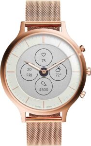 Here's an alt text for the Fossil Women's Charter Hybrid Smartwatch HR: "The Fossil Women's Charter Hybrid Smartwatch HR is a chic and versatile timepiece that blends classic analog design with smart features. It showcases an always-on readout display for quick glances at heart rate, daily activity, and smartphone notifications. The watch features a traditional round face with elegant hands, set within a durable stainless steel case, and is complemented by a comfortable strap suitable for all-day wear. It's the perfect accessory for the modern woman who values both style and connectivity."