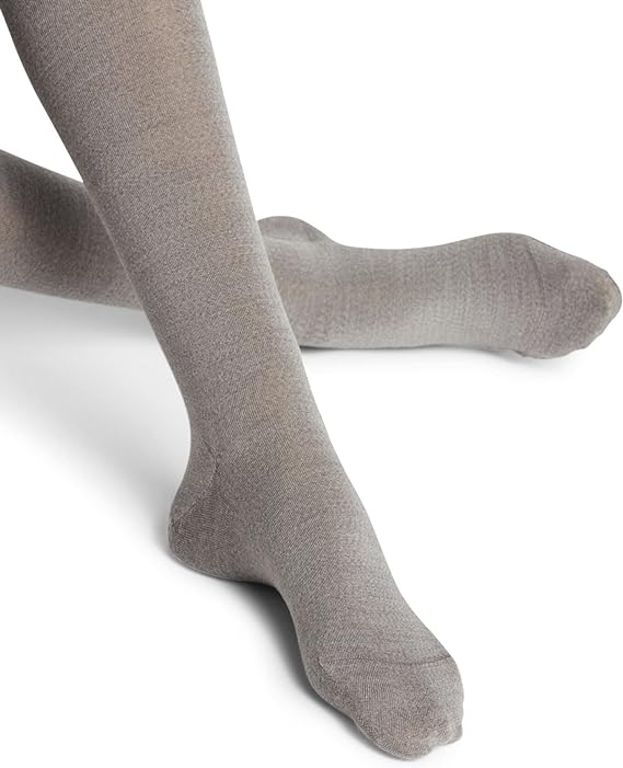 “Thick, warm, and breathable merino wool cotton tights for women, suitable for trendy casual or dress wear by Falke.