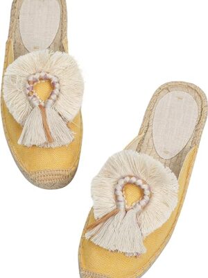 “Stylish canvas mule shoes with red tassel and fluffy ball embellishments. These espadrilles feature a breathable linen fabric upper, soft jute rope insole, and an anti-slip rubber outsole. Perfect for casual wear, vacations, and outdoor activities.” You can find these mule shoes on Amazon1.