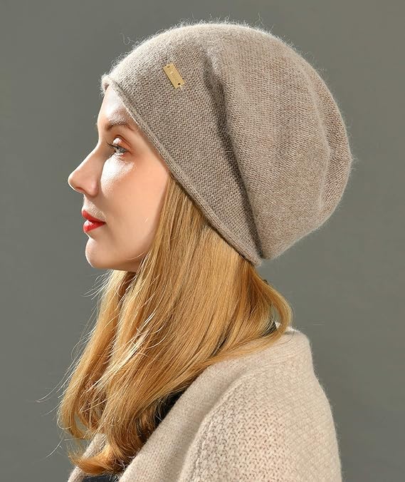 Jaxmonoy Cashmere Slouchy Knit Beanie Hat”: This elegant and soft beanie is made of a cashmere blend (15% cashmere, 35% wool, 20% viscose, and 30% acrylic). It’s lightweight, warm, and breathable, making it comfortable for winter wear. The slouchy style adds a fashionable touch, and its elasticity ensures a good fit. Suitable for both indoor and outdoor activities, this beanie is a great gift option for various occasions