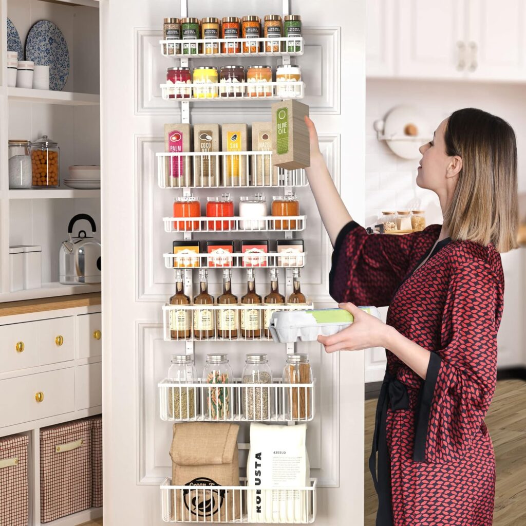 Alt pic of Moforoco-8-Tier-Over-The-Door-Pantry-Organizer”: “Maximize your kitchen space with the sleek Moforoco 8-Tier Over-The-Door Pantry Organizer, featuring black hanging baskets and wall spice rack shelves for efficient seasoning and pantry item storage.