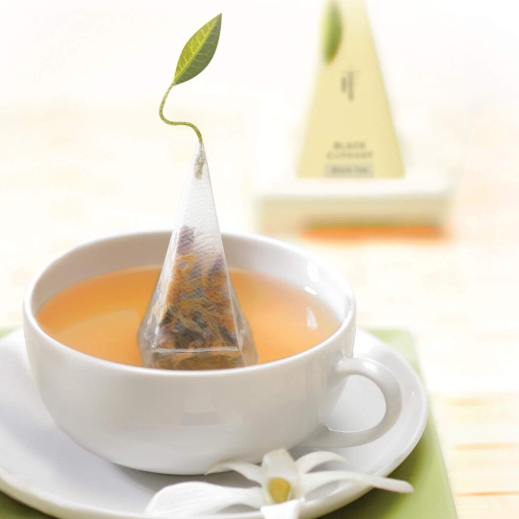 “A rejuvenating blend of organic herbal teas, including Apricot Amaretto, Blueberry Merlot, Cherry Cosmo, Kiwi Lime Ginger, and Mojito Marmalade. Each pyramid tea infuser offers a delightful flavor experience.”
 🍵🌿🍊🍒