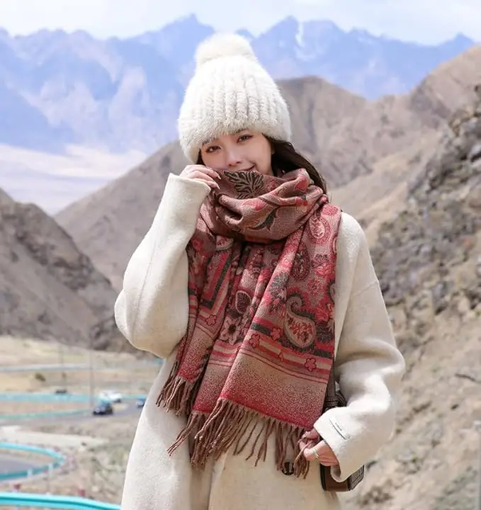 “A cozy, oversized red pashmina shawl with chunky texture, perfect for winter warmth and style.