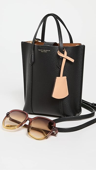 “Effortlessly chic, the Tory Burch Perry Mini Tote combines timeless design with practicality. Crafted from high-quality materials, this mini tote features Tory Burch’s signature logo, sturdy handles, and a versatile crossbody strap. Perfect for those days when you want to carry just the essentials!