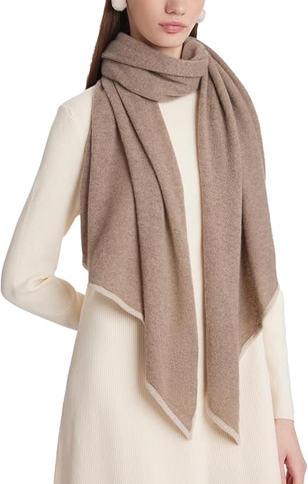 Wrap yourself in luxurious warmth and style with this 100% pure cashmere scarf. Designed in a chic parallelogram shape and dyed a beautiful apricot hue, this lightweight scarf is perfect for winter. Its ultra-soft and cozy texture ensures comfort, while its elegant design adds a sophisticated touch to any outfit. Perfect for both casual and formal occasions, this scarf is a must-have accessory for every woman’s winter wardrobe