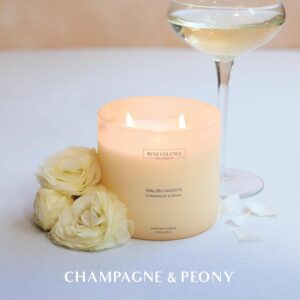 Benevolence LA Malibu Nights Scented Candle: A luxurious 15oz candle with a 50-hour burn time, featuring a delightful Champagne and Peony fragrance. Made from natural wax with a cotton wick, part of the Malibu Sands Collection.