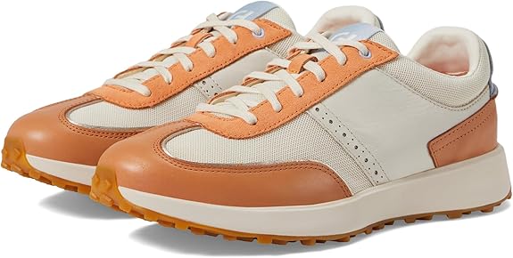 Stylish and comfortable Cole Haan Women's Grand Crosscourt Meadow Runner sneakers. Featuring a sleek design, these sneakers provide excellent support and cushioning for everyday wear. Perfect for adding a sporty yet chic touch to any outfit