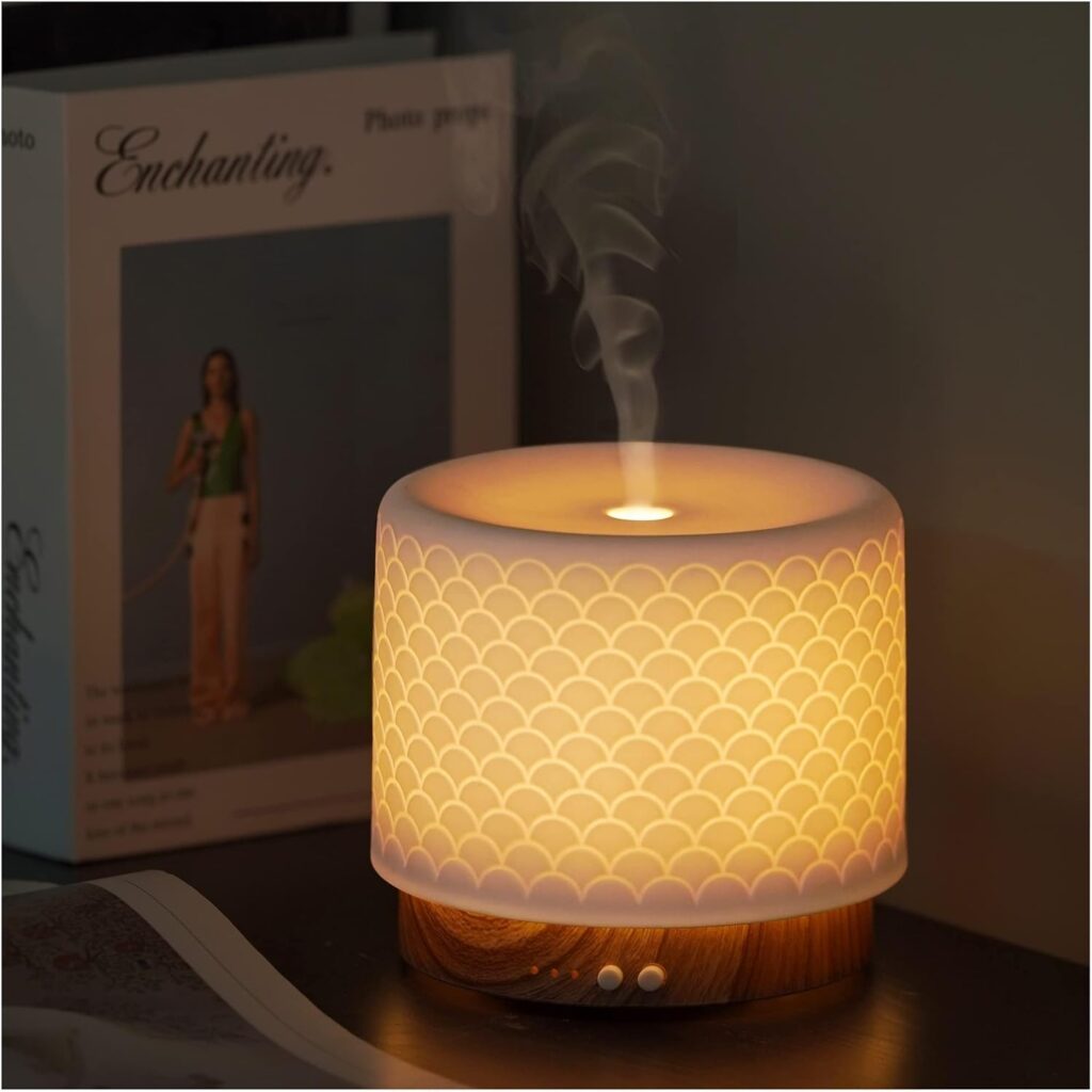 A stylish and aesthetic ceramic essential oil diffuser with a 280ml capacity. This ultrasonic aroma fragrance diffuser emits a cool mist, perfect for creating a calming atmosphere in your home, office, yoga studio, bathroom, or modern commercial space. Combines both functionality and elegance.