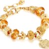 **Alt Text:** A close-up of the Leprato Gold Plated Heart Crown Charm Pendant Glass Crystal Beaded Bracelet, showcasing its gold-plated heart crown charm and colorful glass crystal beads, designed as an elegant jewelry gift for women.