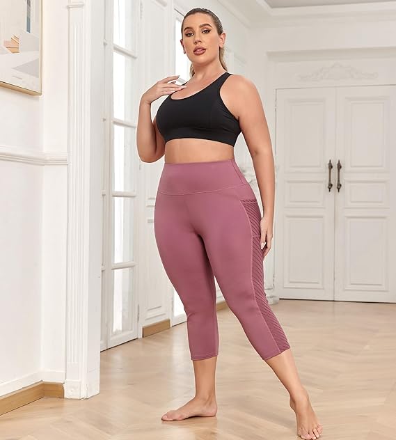 "High-waisted plus size capri leggings for women by Meijing, available in sizes L-5X. These black mesh yoga pants feature convenient pockets and tummy control, providing comfort and support for workouts and daily activities