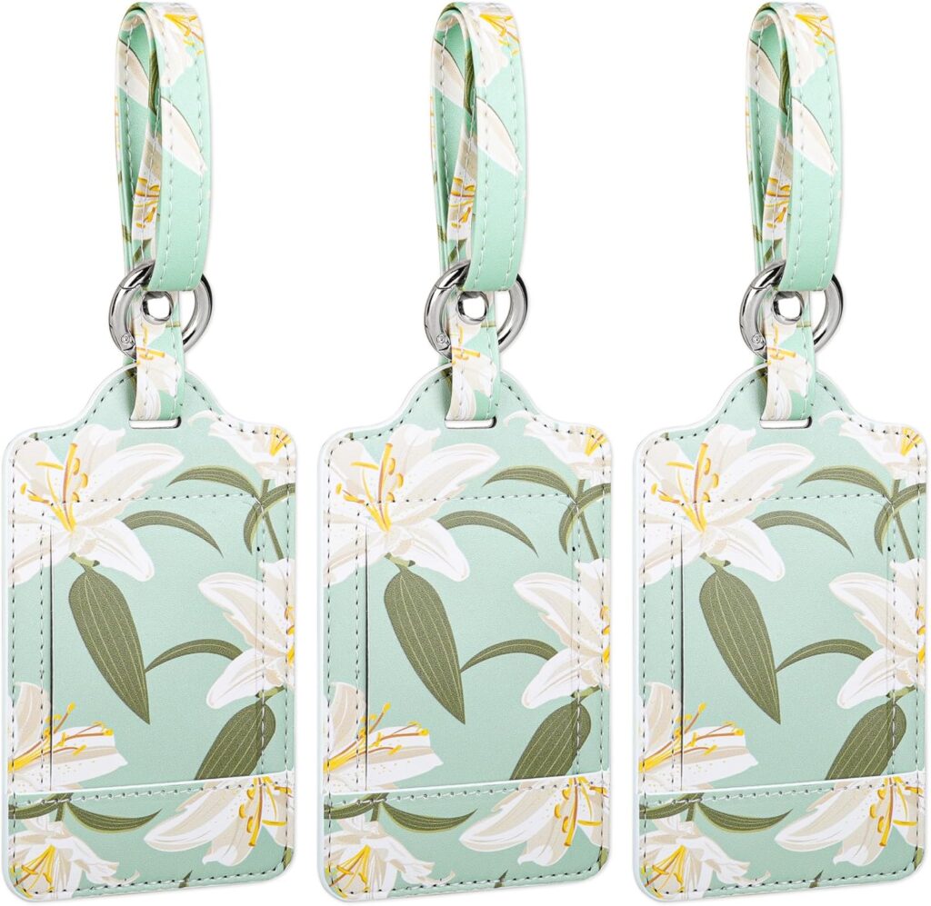 A set of three premium PU leather luggage tags by Teskyer, designed for suitcases and travel bags. These tags feature a privacy protection cover and are decorated with a greenish lily flower design, adding both functionality and style to your travel accessories.