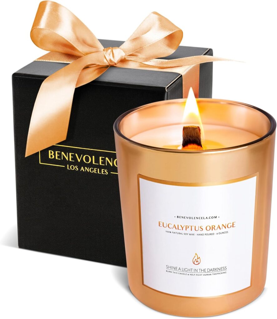 "Benevolence Candles Eucalyptus Orange Wood Wick Candle, an 8 oz soy scented candle perfect for women. Ideal for home use, this candle combines the refreshing scents of eucalyptus and orange, creating a soothing and calming atmosphere."