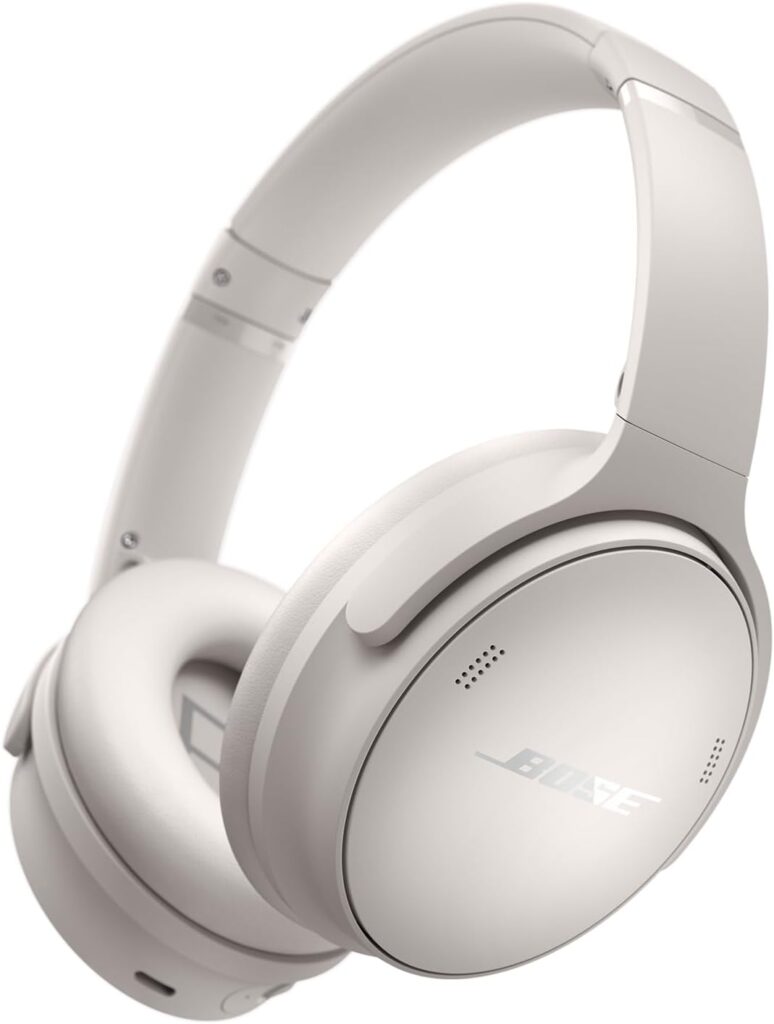 "Bose QuietComfort Wireless Noise Cancelling Headphones in White Smoke color. Bluetooth over-ear headphones offering up to 24 hours of battery life. Known for their exceptional sound quality, comfortable design, and industry-leading noise cancellation features