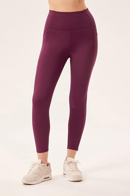 Girlfriend Collective Compression Pocket Leggings for Women in blue, featuring a high-waist design and convenient side pockets. These leggings provide a snug and supportive fit, perfect for workouts or everyday wear, while offering stylish and functional performance