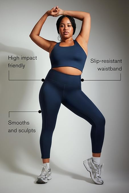 "Girlfriend Collective Compression Pocket Leggings for Women in blue, featuring a high-waist design and convenient side pockets. These leggings provide a snug and supportive fit, perfect for workouts or everyday wear, while offering stylish and functional performance."