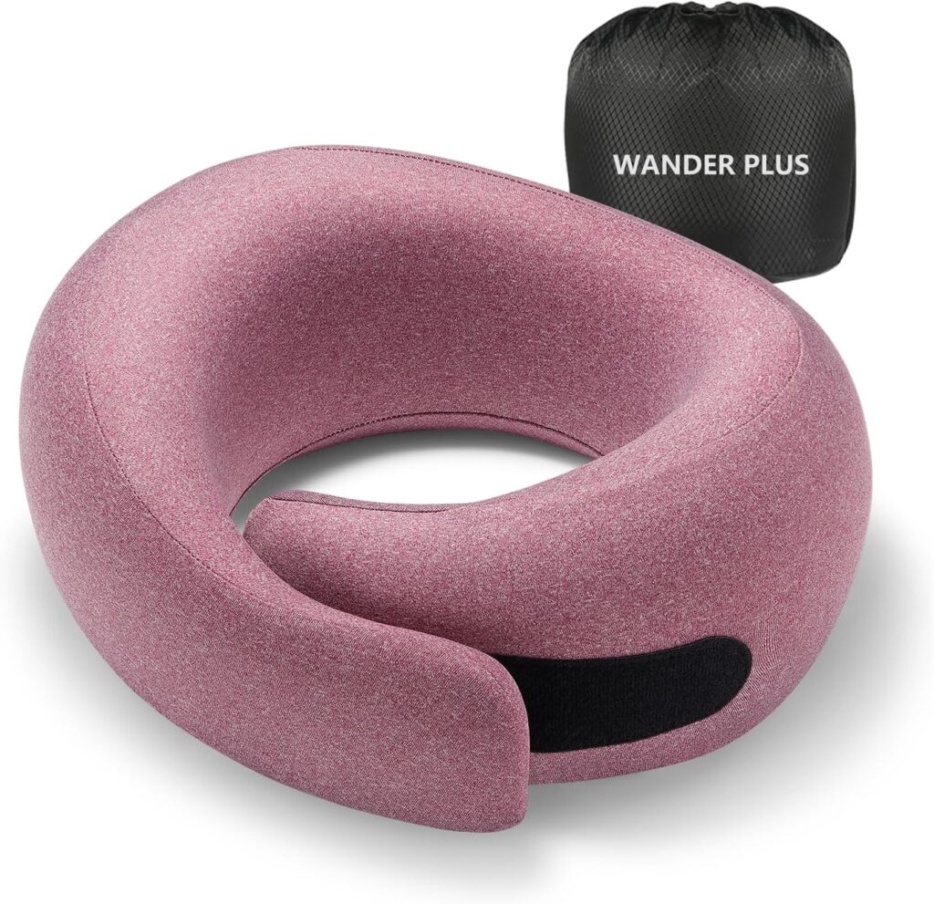 "WANDER PLUS® Travel Neck Pillow in Max Grey. Best for sleeping on planes, cars, trains, and in the office. Ergonomic design with memory foam for optimal neck support. Packable, stuffable, and inflatable for convenient travel use."