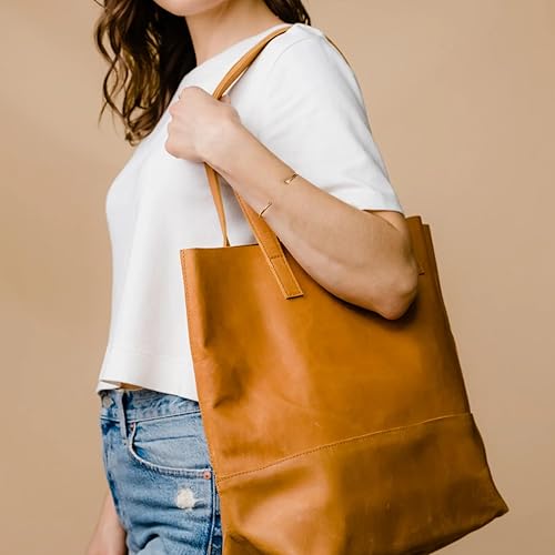 Able Clothing Mamuye Classic Leather Tote Bag – a sleek, handcrafted leather tote in a timeless design with sturdy handles, a spacious interior, and a rich, supple finish