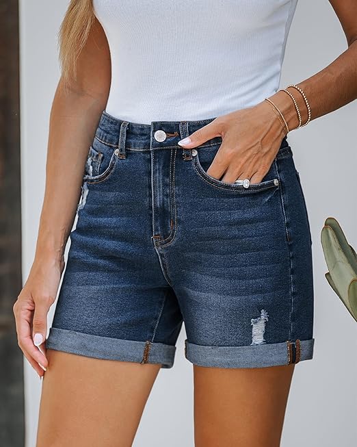 Model wearing LookbookStore jean shorts paired with a casual white top, showcasing the stylish distressed denim design and flattering high-waisted fit.